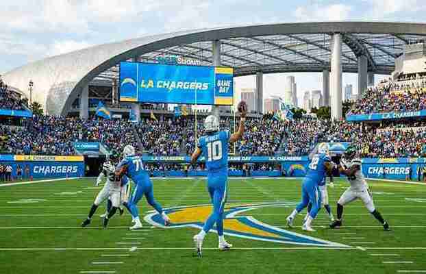 Los Angeles Chargers football team helmet and logo displayed on an NFL stadium field during game day